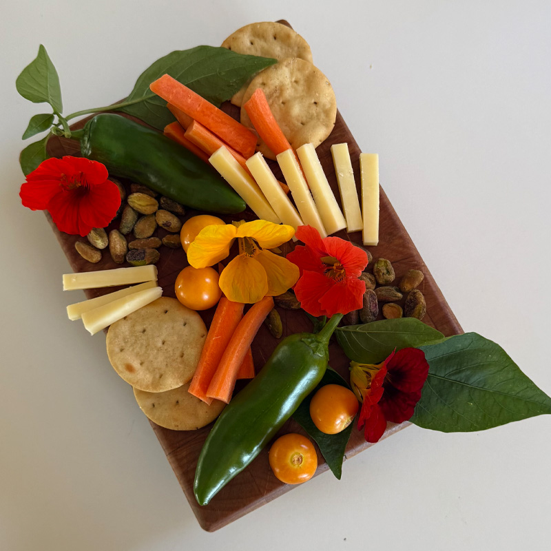 1- Clean Wood Cutting Board - food and flowers