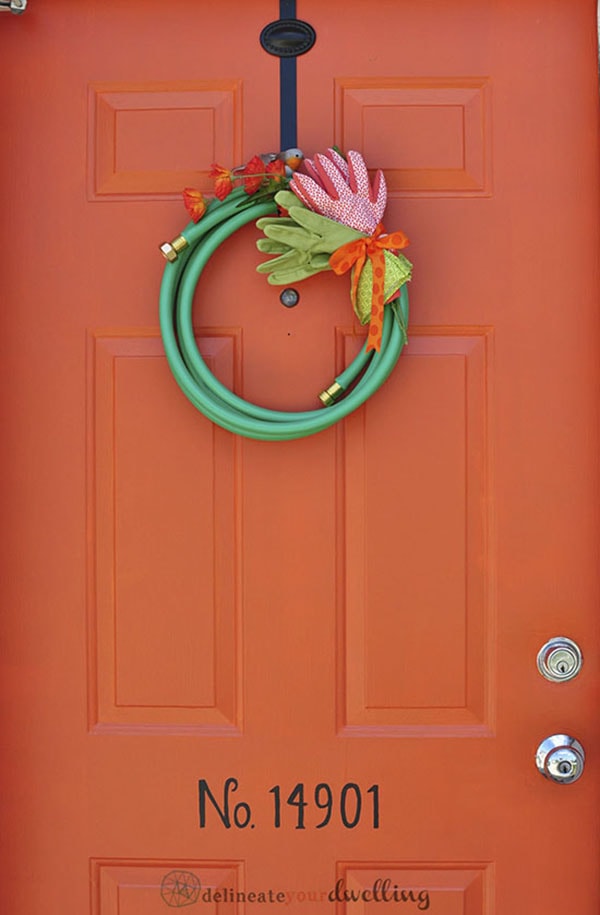 See how to take those Spring time Yard Tools and turn them into a fun seasonal wreath! Such a great way to re-use and turn into Front Door decor.  Delineate Your Dwelling #springfrontdoor 