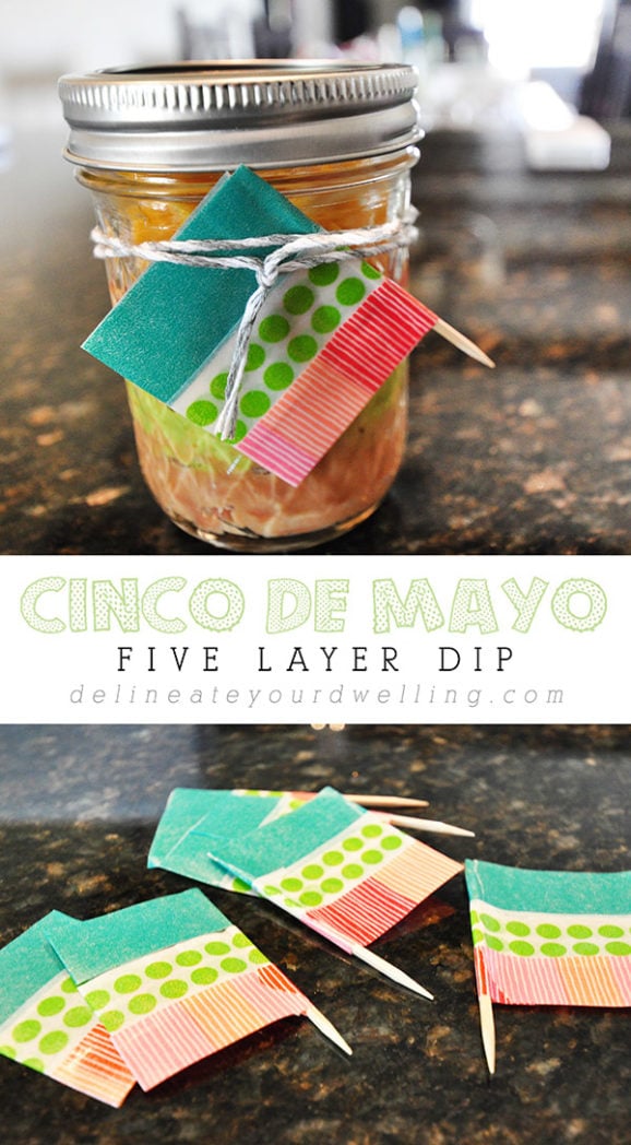 Celebrate Cinco De Mayo by creating adorable mason jar Five Layer Dip appetizers to enjoy at your festive holiday celebration! Delineate Your Dwelling #5layerdip #CincoDeMayo