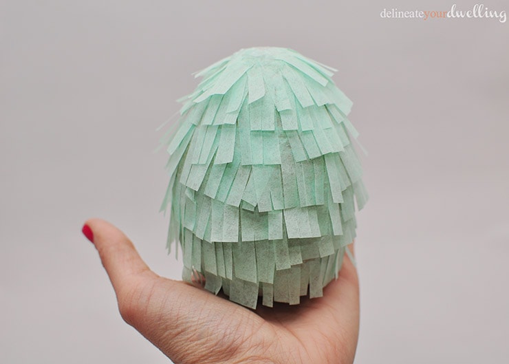 Learn how to make gorgeous tissue paper Fringe Easter Eggs! Set them out on display at your Spring Table or hide them during your Egg Hunt. Delineate Your Dwelling #fringeegg #fringeEasterEgg
