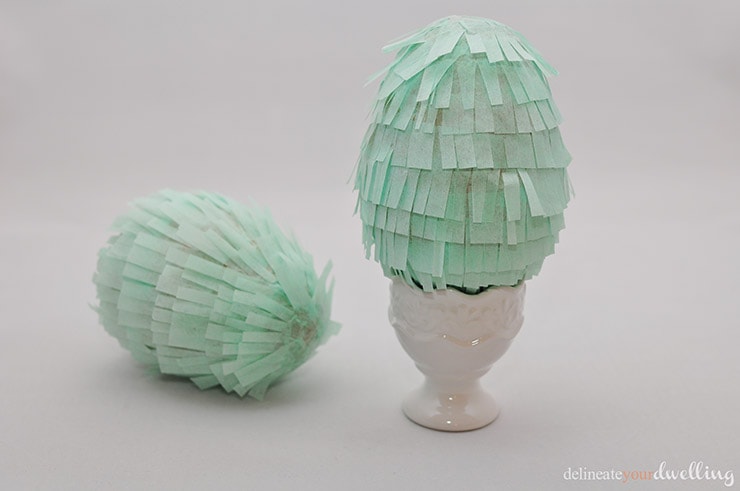 Learn how to make gorgeous tissue paper Fringe Easter Eggs! Set them out on display at your Spring Table or hide them during your Egg Hunt. Delineate Your Dwelling #fringeegg #fringeEasterEgg