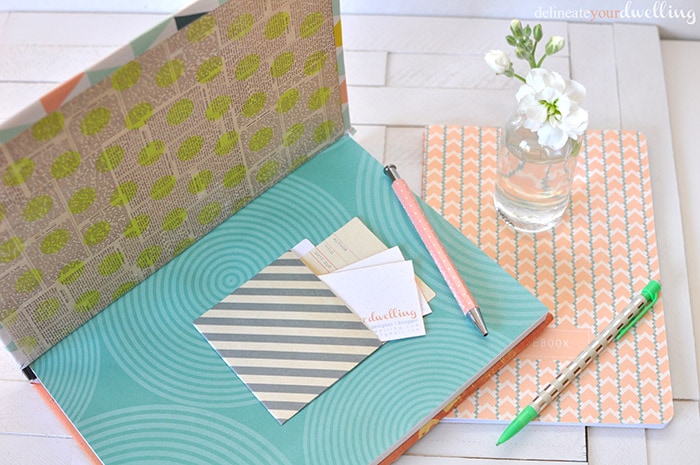 Learn how to customize your notebook cover in a few simple steps using fun and colorful scrapbook paper! Personalize your notebook to reflect your style. Delineate Your Dwelling #customnotebook #DIYnotebook #DIYjournal