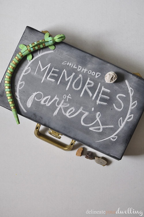 Learn how to take an old Cassette Case and repurpose it into a fun chalkboard Memory Box to fill with special treasures and mementos. Delineate Your Dwelling #memorybox #DIYcassettecase #chalkboardbox