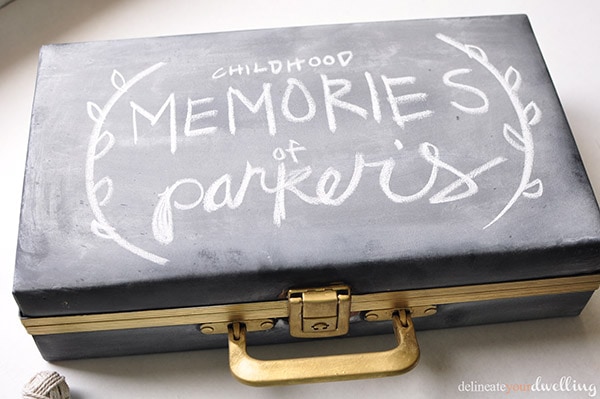 Learn how to take an old Cassette Case and repurpose it into a fun chalkboard Memory Box to fill with special treasures and mementos. Delineate Your Dwelling #memorybox #DIYcassettecase #chalkboardbox