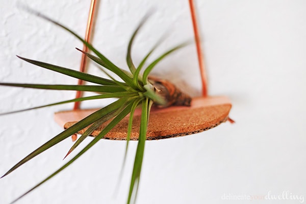 Simple and mini Copper pipe shelves. Fun to make and perfect to hold small decor on your wall. | Delineate Your Dwelling