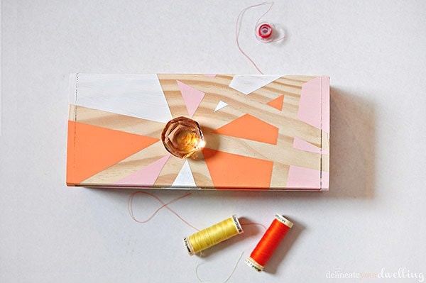 Learn how to create a gorgeous geometric thread box using washi tape and acrylic paint.  You will love this simple DIY craft project so much, you'll want to paint all the boxes. Delineate Your Dwelling #paintedbox #geometricbox