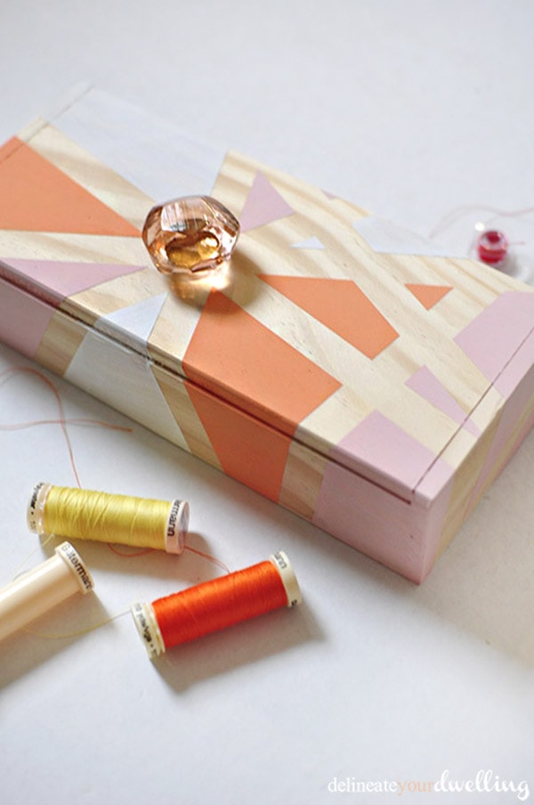 Learn how to create a gorgeous geometric thread box using washi tape and acrylic paint.  You will love this simple DIY craft project so much, you'll want to paint all the boxes. Delineate Your Dwelling #paintedbox #geometricbox