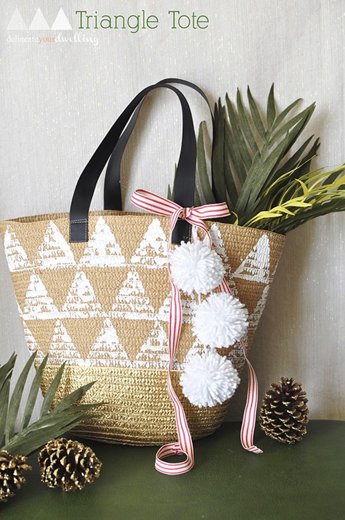 Learn how to make an easy Handmade Triangle Tote bag using a stenciled sponge painting technique. Delineateyourdwelling.com #spongecraft #paintedtote