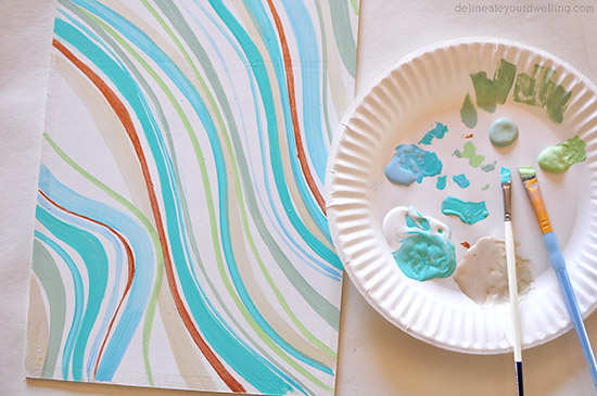 Learn how to create a statement marbled piece using simple acrylic paint and an old wooden toy container. In just a few steps you'll be painting your own Marbled Wall Shadow Box. Delineate Your Dwelling #paintedshadowbox #DIYshadowbox