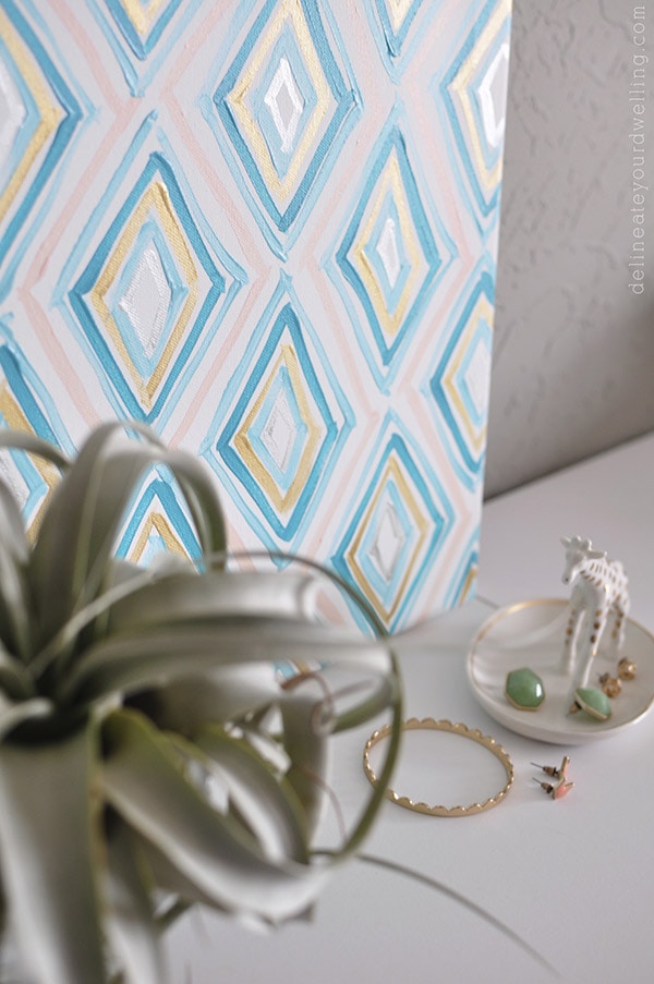 Learn how to make Easy Art for your home with abstract Diamond Patterns. Using acrylic paint, a canvas and a fun DIY tutorial you can become your own artist. Delineate Your Dwelling #easyart #abstractart #diamondart