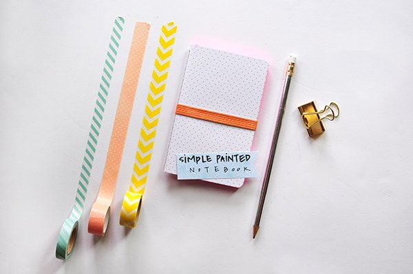 Learn how to create a simple colorful DIY Painted Notebook edge! This is a fun DIY craft project for children and adults alike.  Check out all the ways it brightens up any old notebook or notepad. Delineate Your Dwelling #DIYpaintednotebook #AcrylicPaintNotebook #paintednotebook