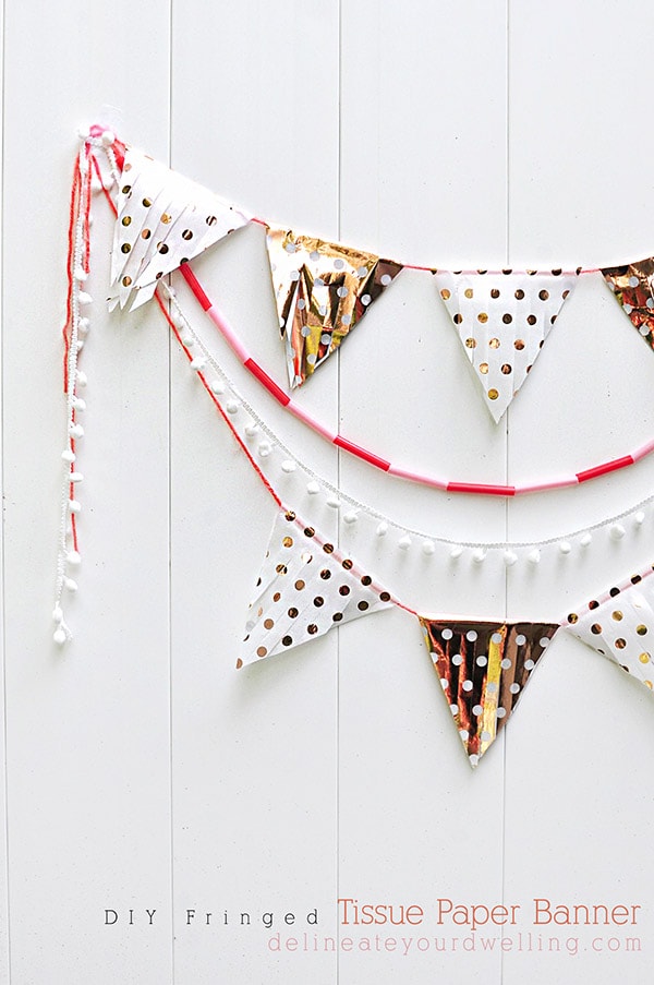 Learn how to make a Tissue Paper Banner as a fun DIY party decor item! See the quick steps to help add festive wonder to your next party while using tissue paper. Delineate Your Dwelling #tissuepaperbanner #tissuepapercraft #paperbanner