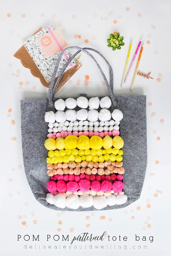 Learn how to make this fun modern Pom Pom Patterned Tote Bag to carry around all your things while on the go! Tons of texture built into this one. Delineate your Dwelling #pompom #pompomcraft #pompomtote