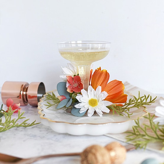 1 Floral Champagne Saucer Glasses