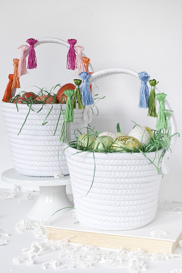 First, learn how to make tassels using Embroidery Floss. Then apply those tassels to any type of basket, making a simple and fun DIY Tassel Easter Basket for Easter this year! Delineate Your Dwelling #easterbasketDIY #tasselbasket #DIYEasterBasket #DIYEaster