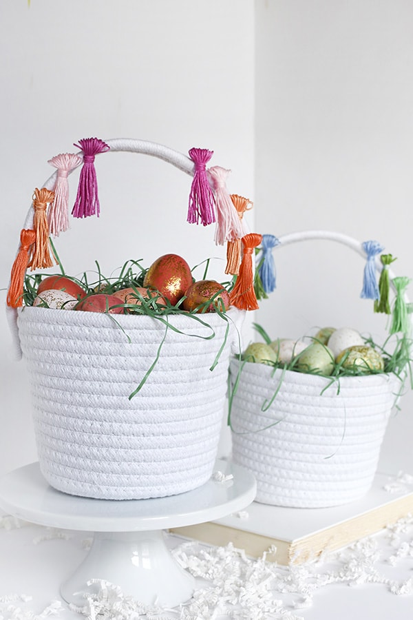 First, learn how to make tassels using Embroidery Floss. Then apply those tassels to any type of basket, making a simple and fun DIY Tassel Easter Basket for Easter this year! Delineate Your Dwelling #easterbasketDIY #tasselbasket #DIYEasterBasket #DIYEaster