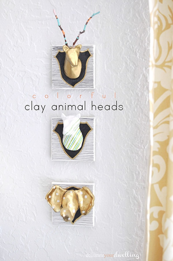 See how simple it is to make these DIY Air Dry Clay decor pieces for your home! Create these whimsical Colorful Clay Animal Heads in no time at all to hang on your walls. Delineate Your Dwelling #airdryclay #claycraft