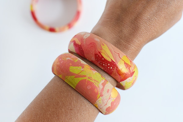 Colorful bracelets on arm