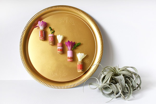 Easiest ever, DIY Mini Cork Flower Vases! Little pops of happy flowers wherever you like. Delineate Your Dwelling