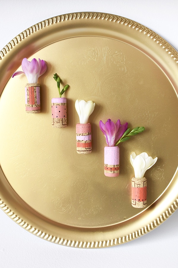 Easiest ever, DIY Mini Cork Flower Vases! Little pops of happy flowers wherever you like. Delineate Your Dwelling