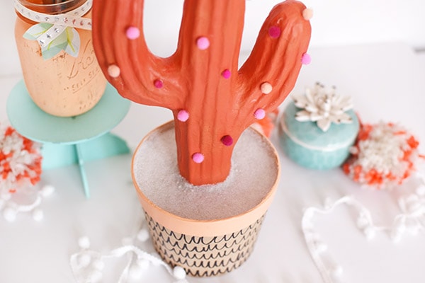 Bring some bold color to your home with a fun DIY Pom Pom Cactus! Delineate Your Dwelling