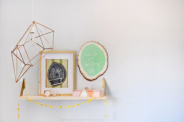 How to create an inexpensive and gorgeous Modern DIY Geometric Pendant Lamp using simple wooden skewers. Plus, it adds so much drama to your room! Delineate Your Dwelling #modernlamp #DIYlamp