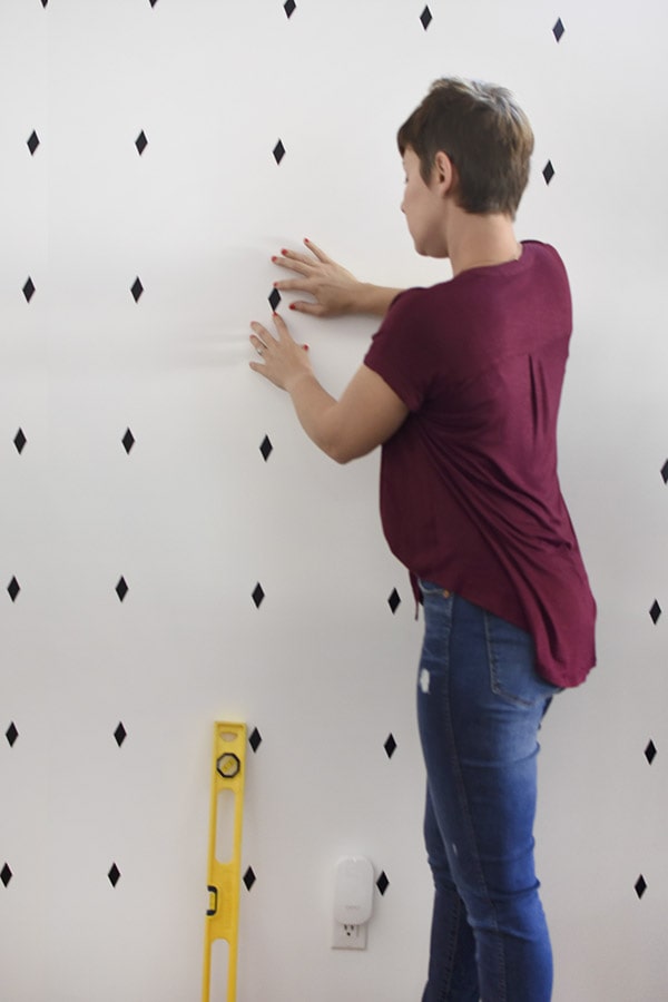 Make quick decals for an inexpensive professional accent wall in dining room.