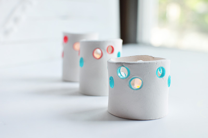Clay candle holders with holes