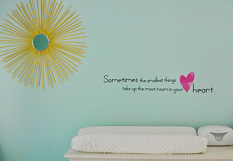 Quote on aqua painted wall