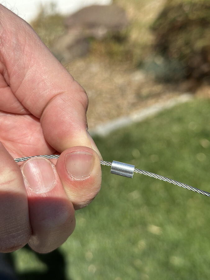 Slipping on a metal crimp to a piece of wire