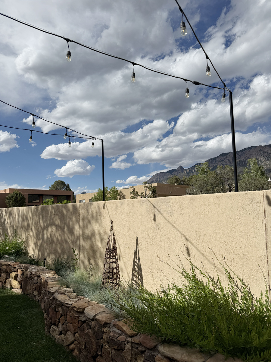 Desert String lights in a backyard overlooking mountain range