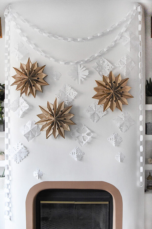 Holiday Paper Bag Stars on fireplace