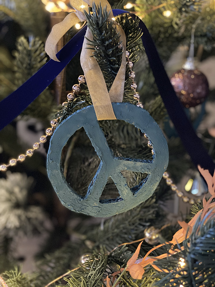 Blue Peace signs on a tree