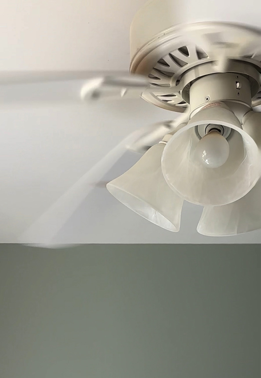 "Before" outdated white ceiling fan