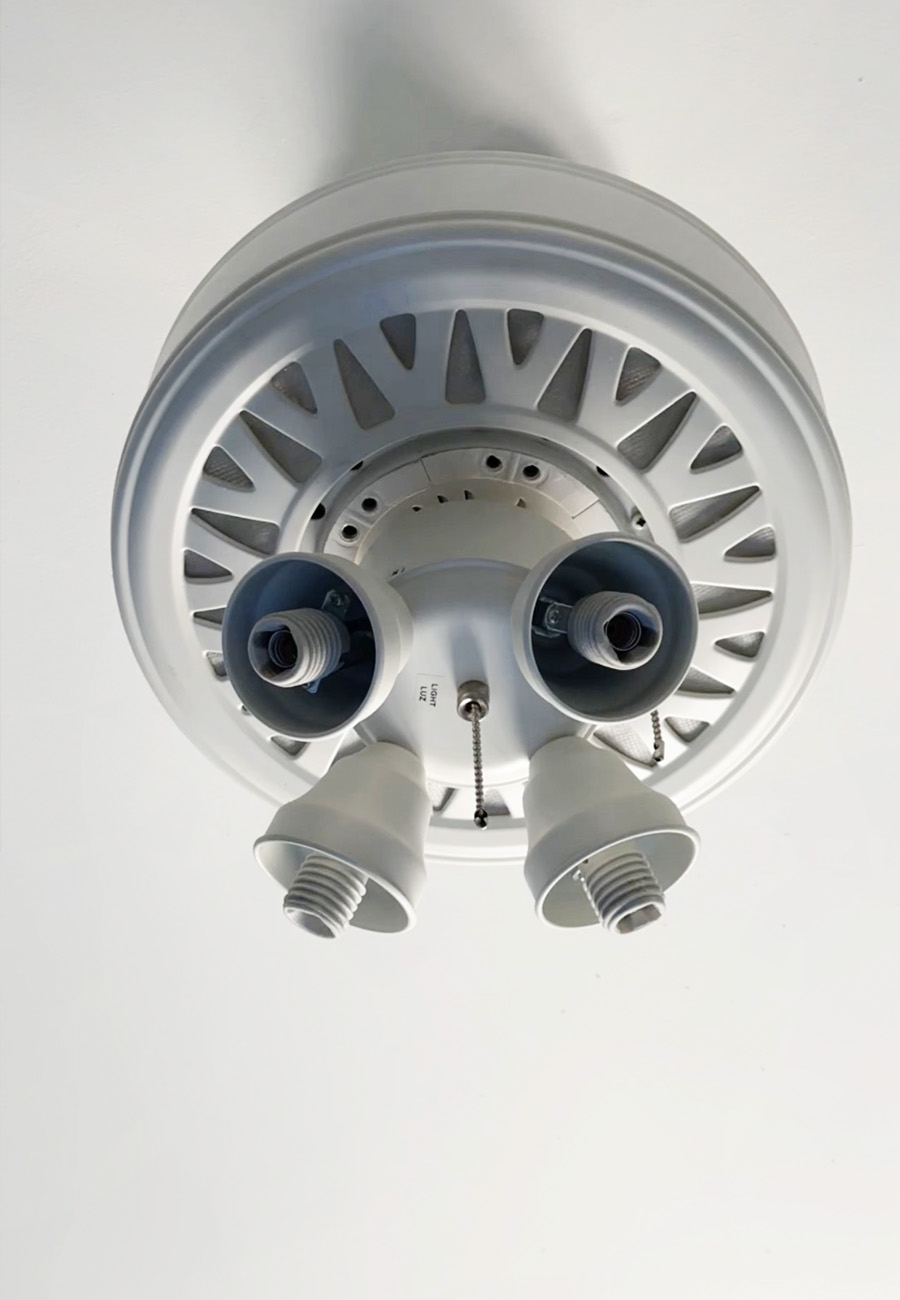 White ceiling fan motor and housing