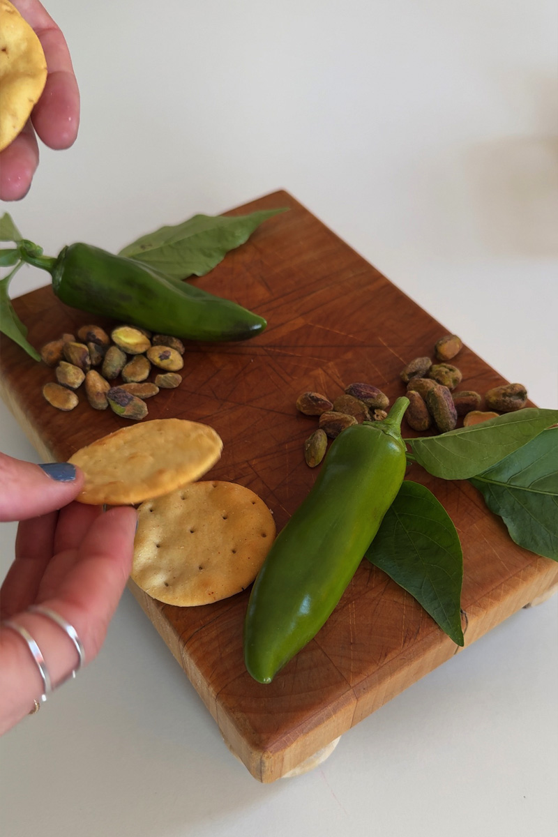 Cracker, pistachio and green pepper charcuterie board