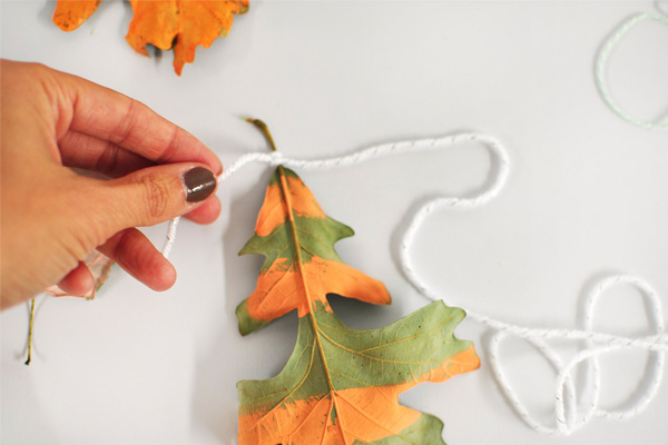 Orange Stripe leaf with yarn tie