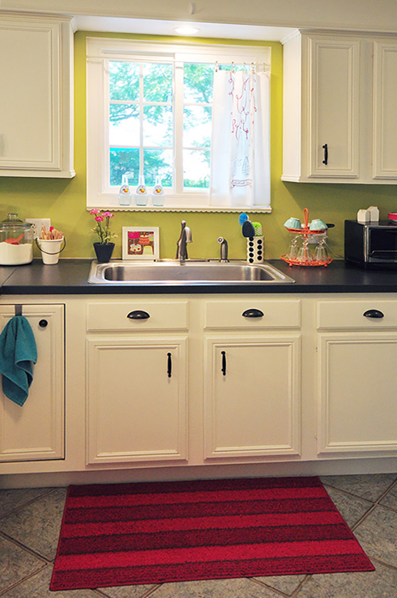 Green walls kitchen sink