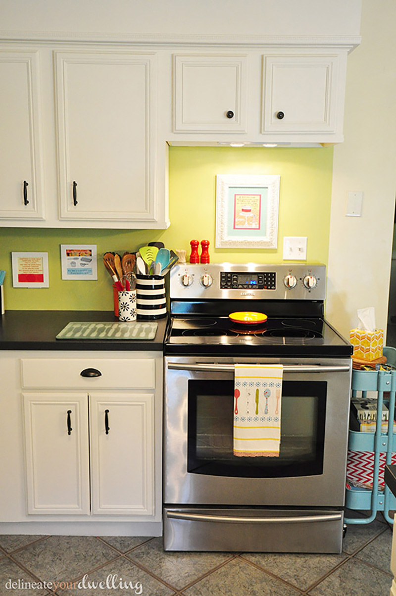 Green kitchen stainless steel stove