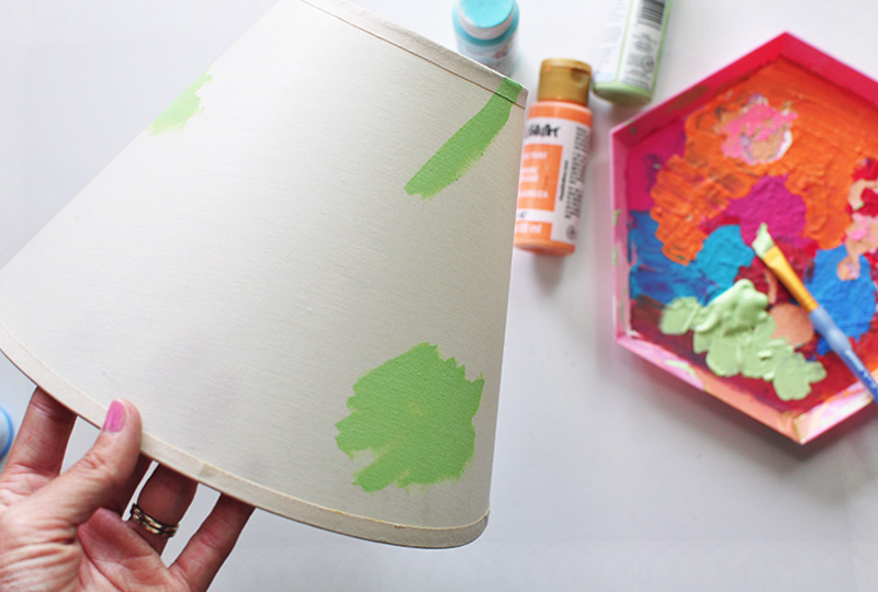 Adding green paint to a lamp shade
