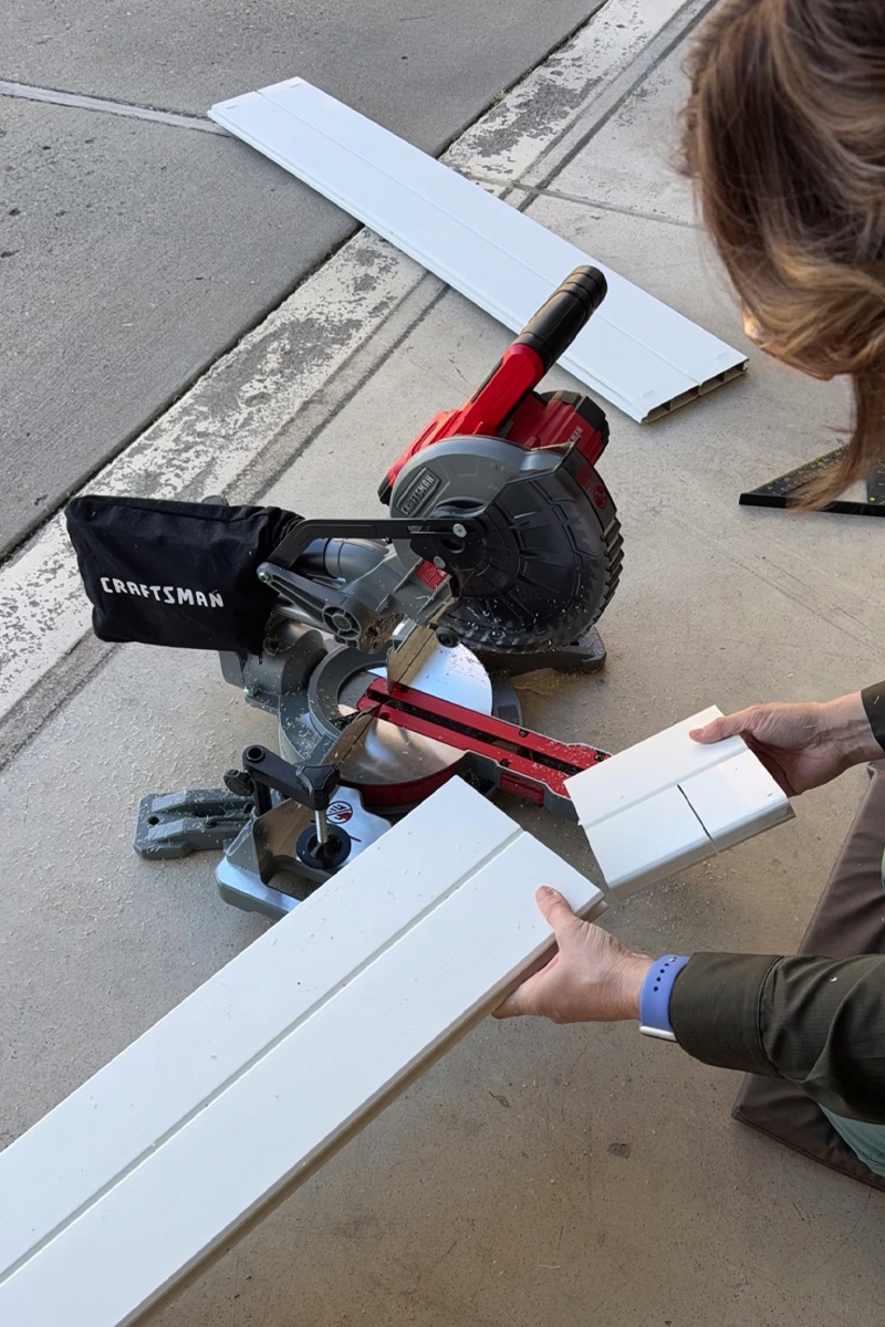 Cutting vinyl raised garden bed panel with a miter saw
