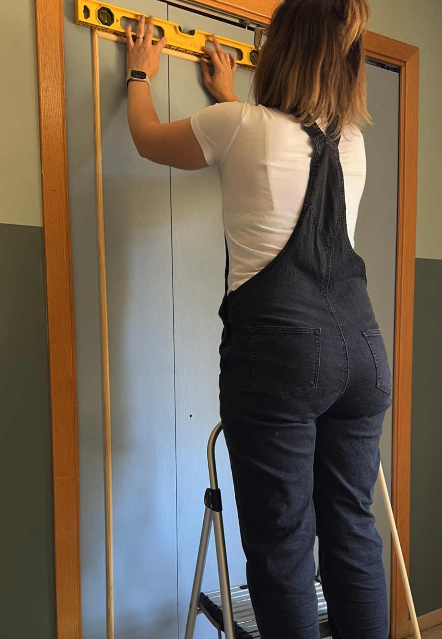 Closet Trim installation with level