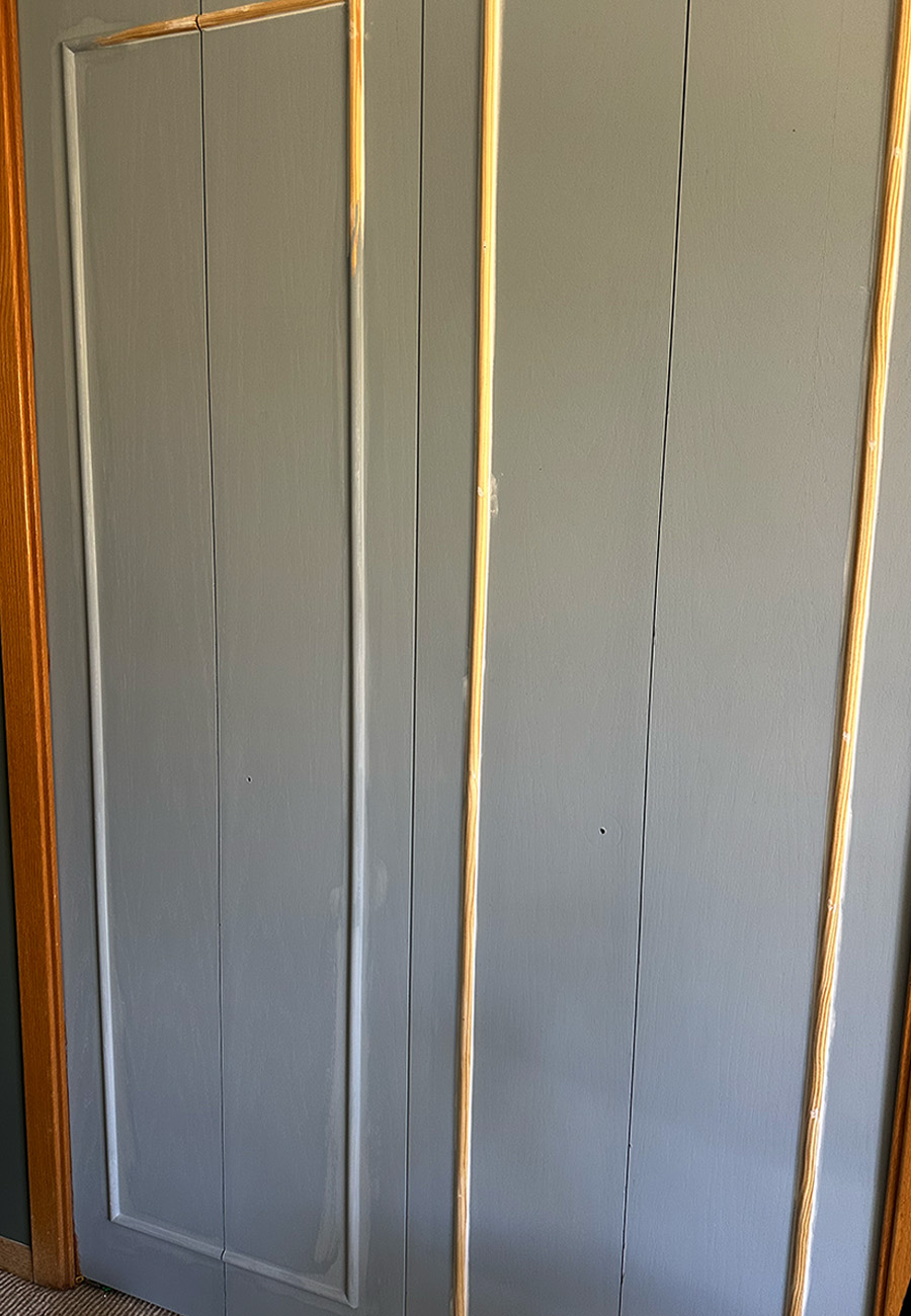 Blue Closet Door with painted trim