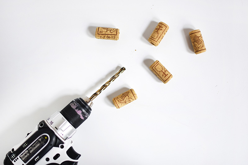 Drilling holes in cork bottle lids