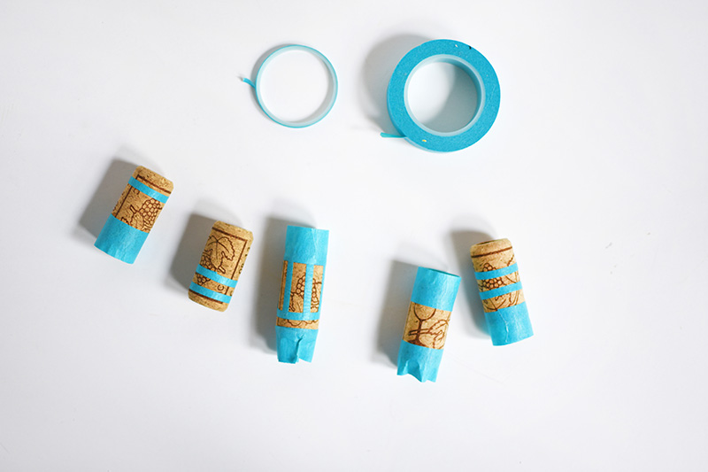 Taped off cork bottle lids