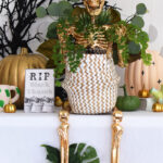 DIY Gold Skeleton Plant lady - black wreath gold pumpkin
