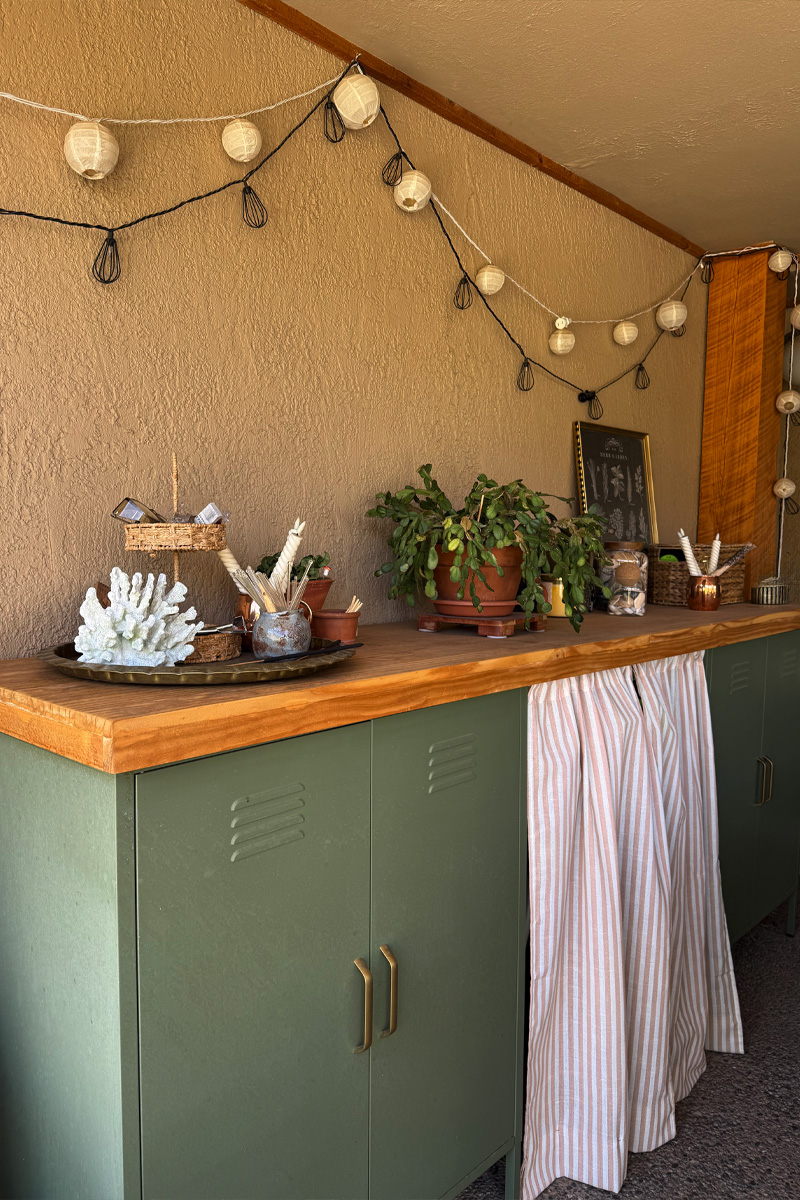 Outdoor storage with wooden DIY tabletop and cafe curtain
