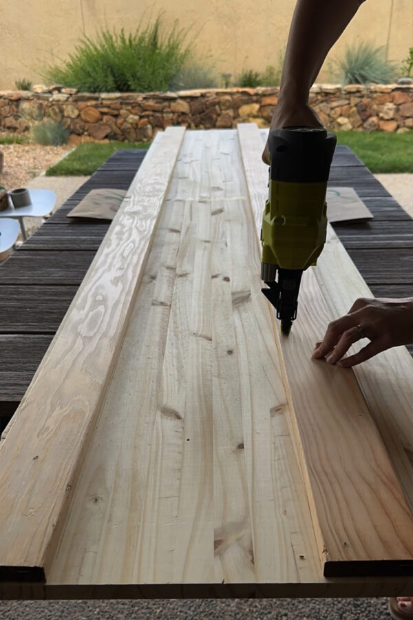 Using a nail gun on wood