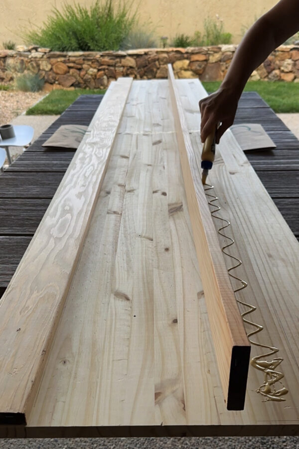 Wood glue to a section of wood