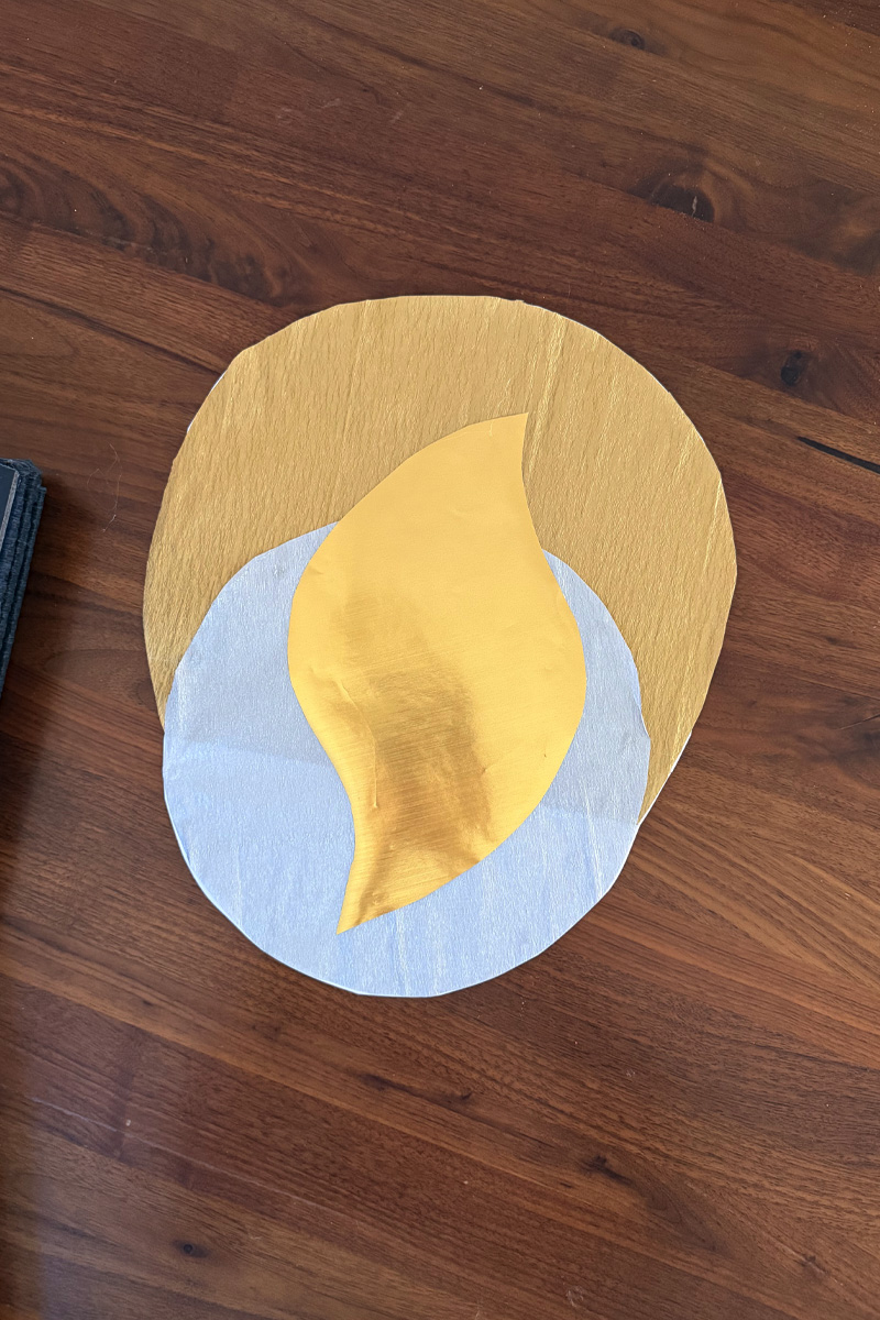 Crepe paper candle glow in gold and silver papers